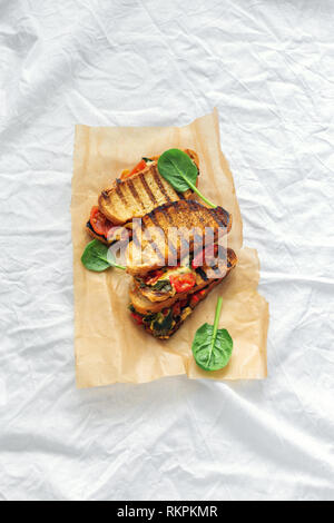 Vegetarian grilled cheese sandwich on white background top view Stock Photo