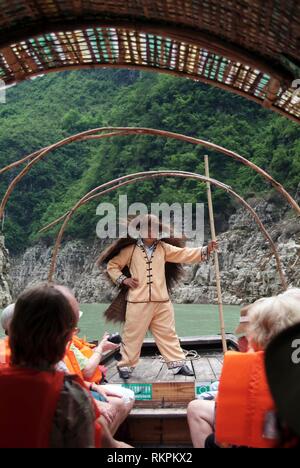 A tourist boat makes its way along the Daning River Small Gorges, a tributary off the Three Gorges on the Yangtze River. An area of great beauty, for  Stock Photo