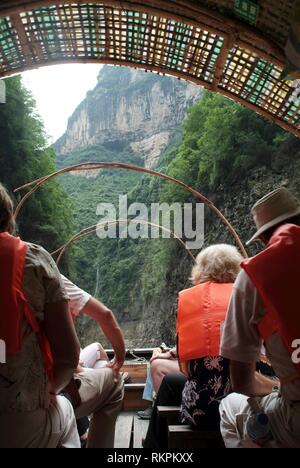 A tourist boat makes its way along the Daning River Small Gorges, a tributary off the Three Gorges on the Yangtze River. An area of great beauty, for  Stock Photo