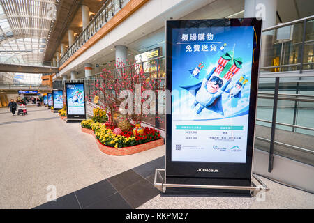 HONG KONG - 29 JANUARY, 2016: inside of Hong Kong International Airport. Hong Kong International Airport is the main airport in Hong Kong. Stock Photo