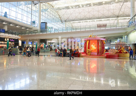 HONG KONG - 29 JANUARY, 2016: inside of Hong Kong International Airport. Hong Kong International Airport is the main airport in Hong Kong. Stock Photo