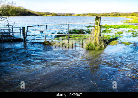 Flooded Gateway - Combe Valley, Bexhill, East Sussex, England Stock Photo