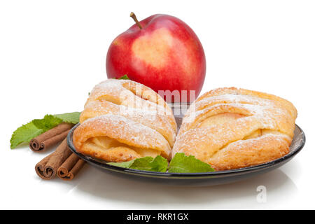 Apple and Cinnamon and mint buns on dish. Stock Photo