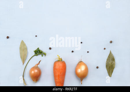 Creative layout made of different vegetables  carrot, onion, black  pepper on light grey background. Food vegan concept.. Flat lay . Stock Photo