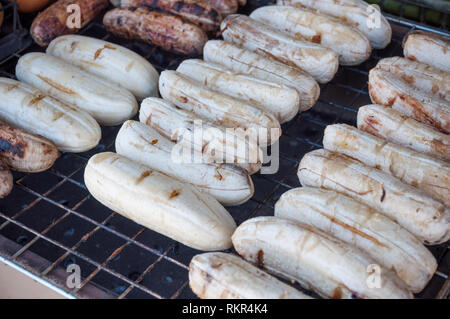 Close up banana grill on stove charcoal background Stock Photo