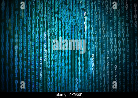 double exposure image of blue binary code data moving vertical direction downward from top of frame to the bottom. data technology and internet global Stock Photo