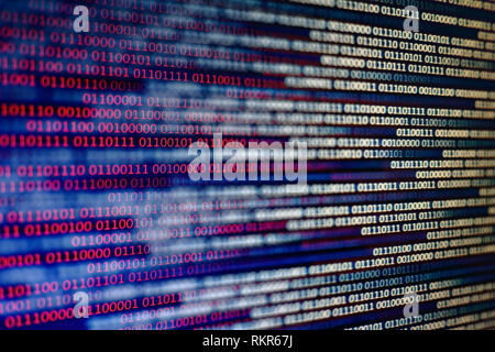 Blue and red binary code background. computer problems concept. black background. malware virus data transfer. Stock Photo