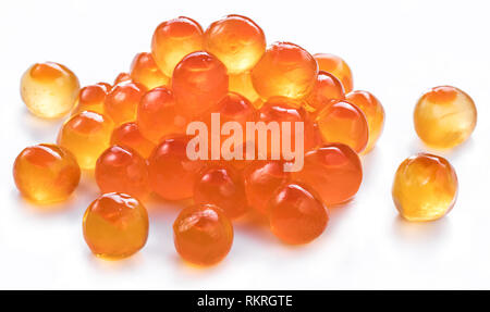 Red caviar on white background. Macro picture. Stock Photo