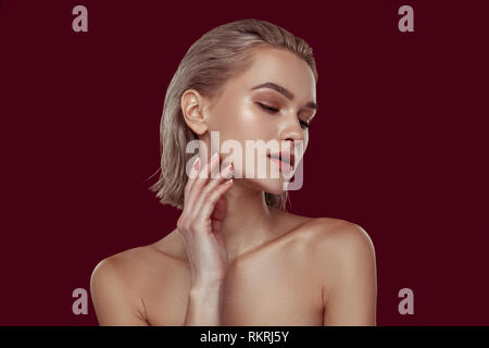 Portrait of slim beautiful blonde-haired photo model Stock Photo
