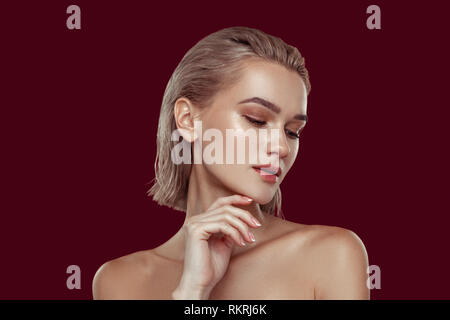 Young blonde-haired model with nice natural makeup Stock Photo