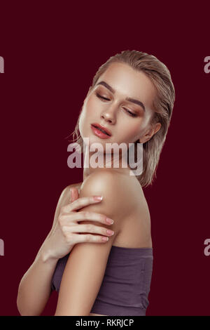 Model posing while working with favorite photographer Stock Photo