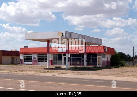 Abandoned gas station on a US highway in Tucumcari, New Mexico, United States of America, along the iconic Route 66. View of a small American town in 
