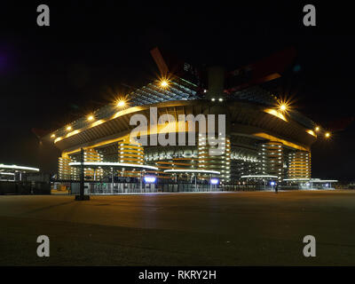 San Siro Stadium house of Inter Milan and Milan AC Football Soccer clubs in Milan Italy by Night. It is also known as Giuseppe Meazza Stadium. Stock Photo