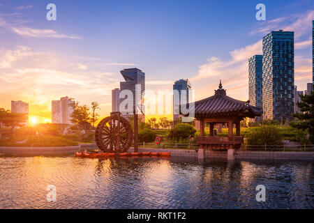 Seoul city with Beautiful sunset, traditional and modern architecture at central park in songdo International business district, Incheon South Korea. Stock Photo