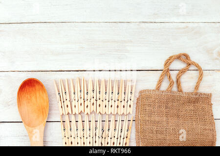 Reusable bag, wooden spoon and wooden clothespins. Zero waste Stock Photo