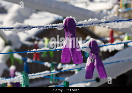 Linen clothespins / Linen clothespins on a winter day Stock Photo