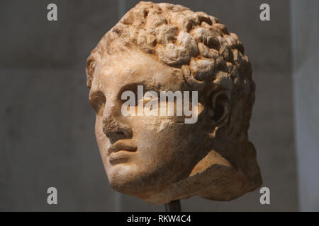 Marble head of a youth from a relief. Greek, late 4th BCE. From Rhores. The Met, Ny, USA Stock Photo