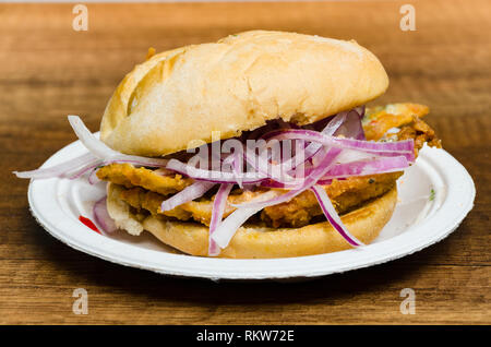 Bread with Pejerrey: It emerged as a tradition in the port of Callao - Lima and years later, it made its way to different districts, becoming the favorite choice for the diners of the marine bars. Stock Photo