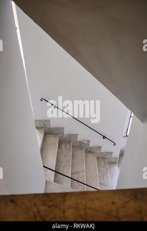 empty marble stairs white walls in the front. Stock Photo