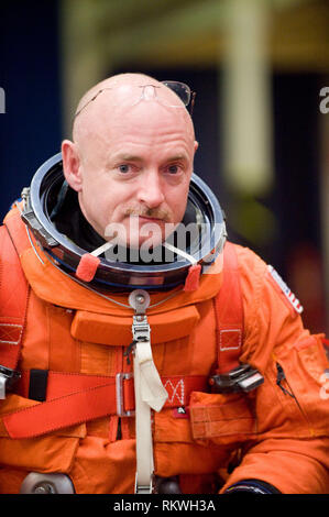 NASA astronaut Mark Kelly, STS-134 commander, attired in a training version of his shuttle launch and entry suit, awaits the start of a training session in the crew compartment trainer (CCT-2) in the Space Vehicle Mockup Facility at NASA's Johnson Space Center on February 11, 2010. Kelly is the husband of United States Representative Gabrielle Giffords (Democrat of Arizona), who was shot in Arizona on Saturday, January 8, 2011.Mandatory Credit: James Blair/NASA via CNP | usage worldwide Stock Photo