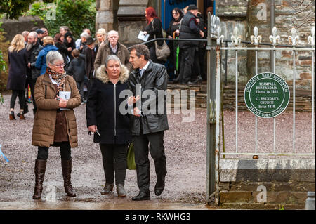 Bantry, West Cork, Ireland. 12th Feb, 2019. The funeral of French artist and writer Tomi Ungerer was held at the Church of St. Brendan the Navigator in Bantry today.  Mr Stéphane Crouzat, Ambassador of France to Ireland, (right, in black jacket) spoke at the funeral with a message from President Macron. Mr Ungerer's remains are to be cremated tomorrow in a private ceremony. Credit: Andy Gibson/Alamy Live News. Stock Photo