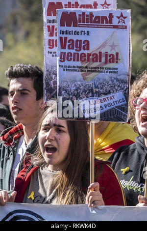 Barcelona, Catalonia, Spain. 12th Feb, 2019. A student is seen in front of the demonstration under the slogan One Republic for all.Coinciding with the first day of trial of the Catalan political prisoners the student community has organized a day of solidarity General Strike under the slogan Republic for the people. Credit: Paco Freire/SOPA Images/ZUMA Wire/Alamy Live News Stock Photo