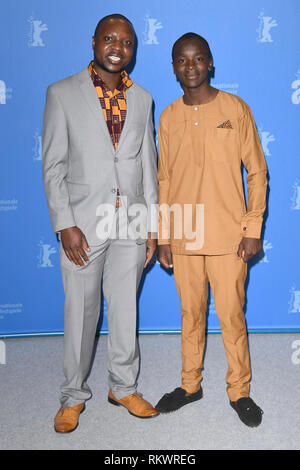 Berlin, Germany. 12th April, 2019. William Kamkwamba and Maxwell Simba attend the photocall for The Boy Who Harnessed The Wind during the 69th Berlinale International Film Festival Berlin at the Grand Hyatt Hotel in Berlin. © Paul Treadway Stock Photo