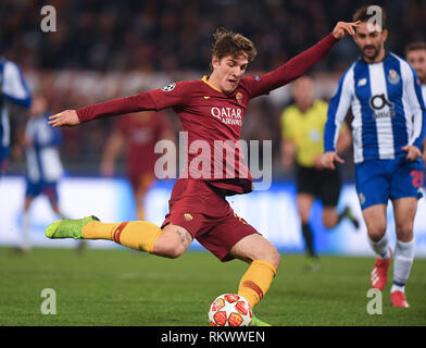 Rome, Italy. 12th Feb, 2019. Roma's Niccolo Zaniolo shoots and scores during the UEFA Champions League round of 16 first leg soccer match between Roma and Porto in Rome, Italy, Feb. 12, 2019. Roma won 2-1. Credit: Alberto Lingria/Xinhua/Alamy Live News Stock Photo