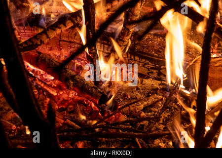 Firewood burning the concept of wood heating Stock Photo