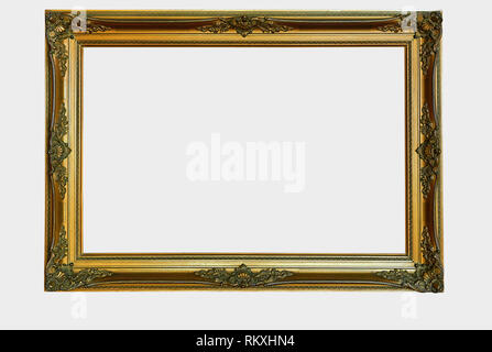 Ornamental wooden gold frame isolated with clipping path Stock Photo