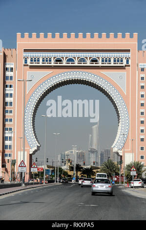 The IBN Battuta Gate Hotel with its huge Arabic arch over the Shekh Zayed Road in Downtown Dubai, Dubai in the in the United Arab Emirates, (UAE) Stock Photo