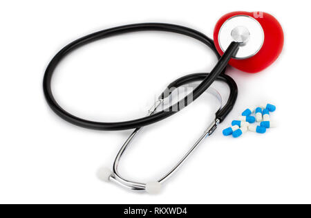 Medical,  stethoscope pills and heart on a white background. Stock Photo