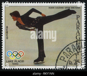 RUSSIA KALININGRAD, 19 APRIL 2017: stamp printed by Paraguay, shows Figure Skater Robin Cousins from Great Britain at Winter Olympics at Lake Placid,  Stock Photo