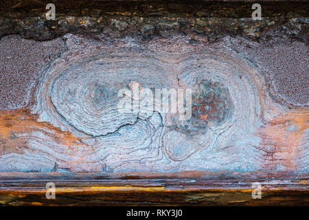 A heavily rusted girder beam inside an old anti-aircraft battery, Cove, Wester Ross Stock Photo