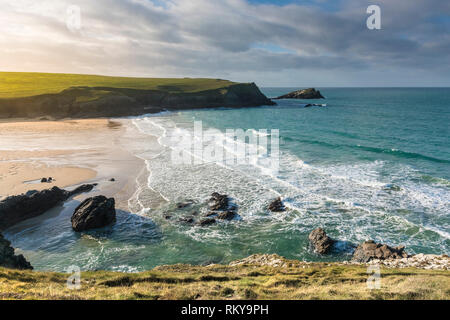 Incoming tide at Porth Joke Beach on the North Cornwall coast in England. Stock Photo