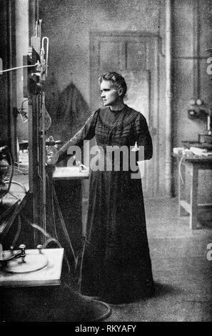 Marie Curie (1867-1934) portrait photograph in her laboratory, circa1920s Stock Photo