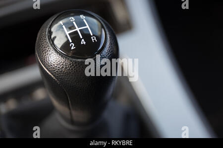 A 5 speed gear shift up close. Stock Photo