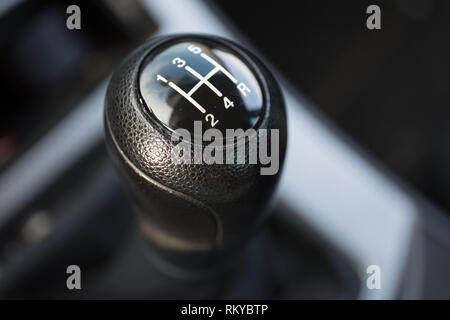 A 5 speed gear shift up close. Stock Photo