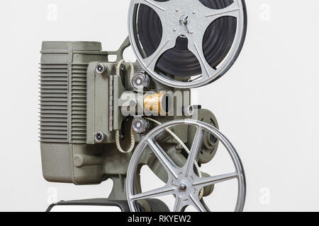 Vintage 8mm home film movie projector with white background. Stock Photo