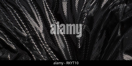 Gray black metalic silver polka dot fabric texture background Stock Photo
