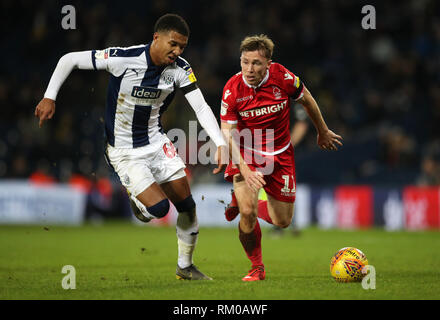 West Bromwich Albion's Mason Holgate and Nottingham Forest's Ben Osborn battle for the ball during the Sky Bet Championship match at The Hawthorns, West Bromwich. Stock Photo