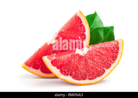 Grapefruit slices with leaves isolated on white background. Stock Photo