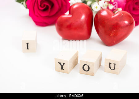 Greeting e-card / Name Day / Love on wooden cubes with roses in the  background