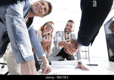 close up.businessman and architect shaking hands Stock Photo