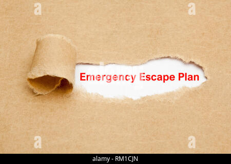 Text Emergency Escape Plan appearing behind torn paper. Concept about evacuation safety precaution preparedness in case of fire or other extreme event Stock Photo