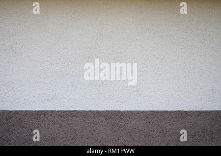Texture of rough concrete wall with embossed texture. Smooth gray surface Stock Photo