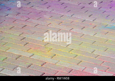 Multi colored earth, paving slabs, powder coated with dry colors at the Holi festival close up Stock Photo