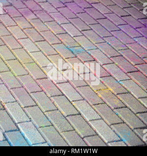 Multi colored earth, paving slabs, powder coated with dry colors at the Holi festival close up Stock Photo