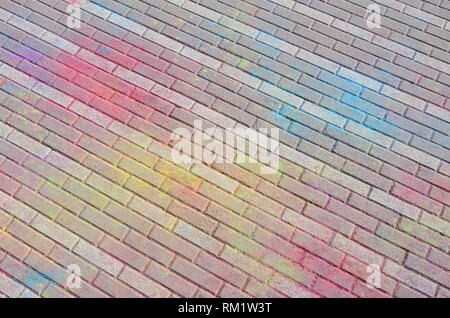 Multi colored earth, paving slabs, powder coated with dry colors at the Holi festival close up Stock Photo