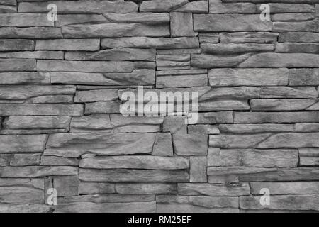 Black and white stone wall for background or texture Stock Photo